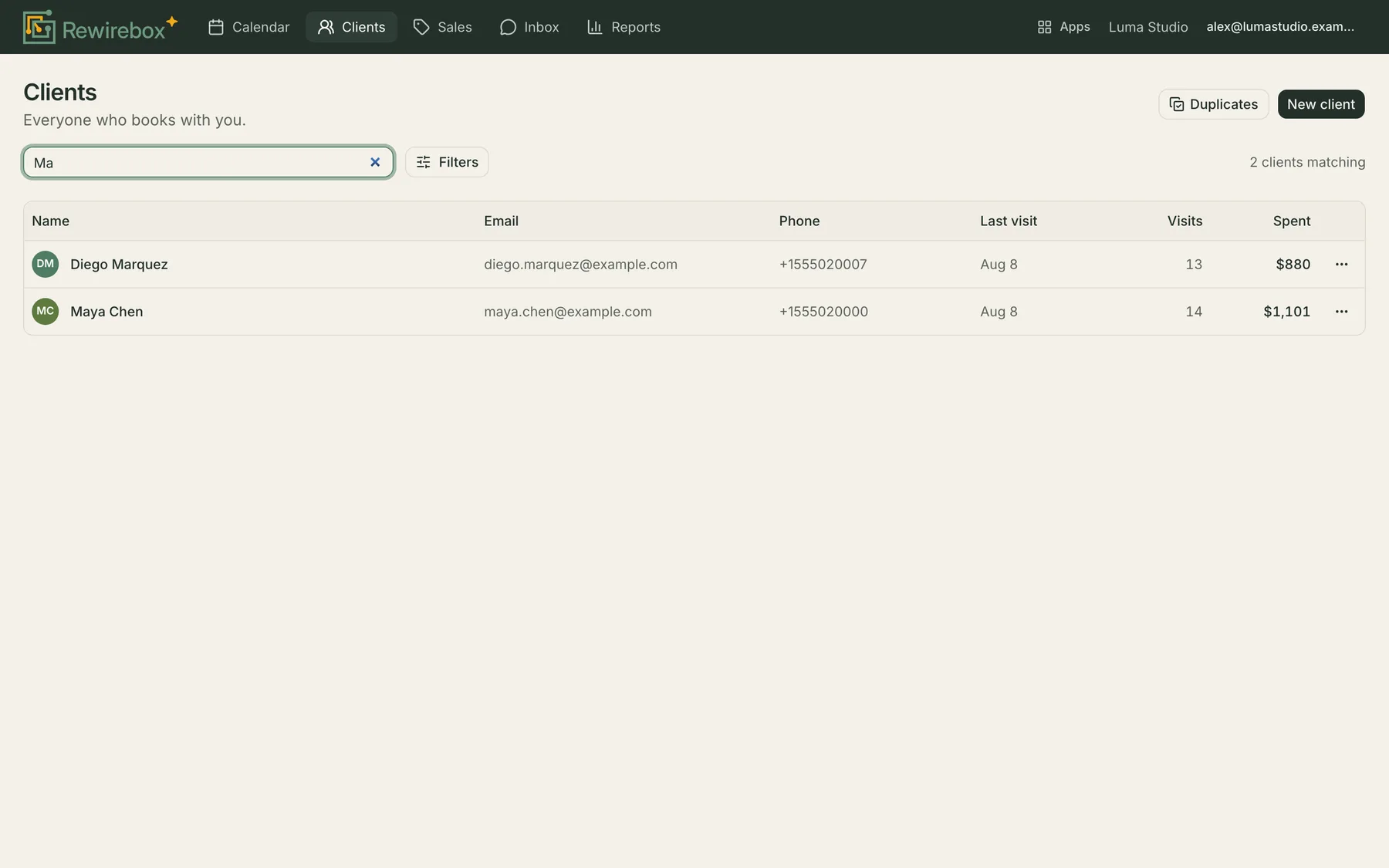 The RewireBox client list narrowing to matching rows as a name is typed into the search box, with each row showing the email and phone that tell two records of the same person apart.