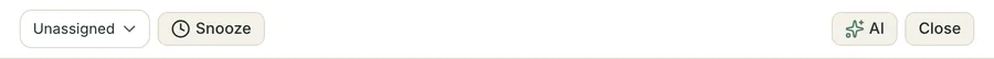 The toolbar above a conversation: an assignee picker reading Unassigned, a Snooze dropdown, an AI menu button and a Close button.