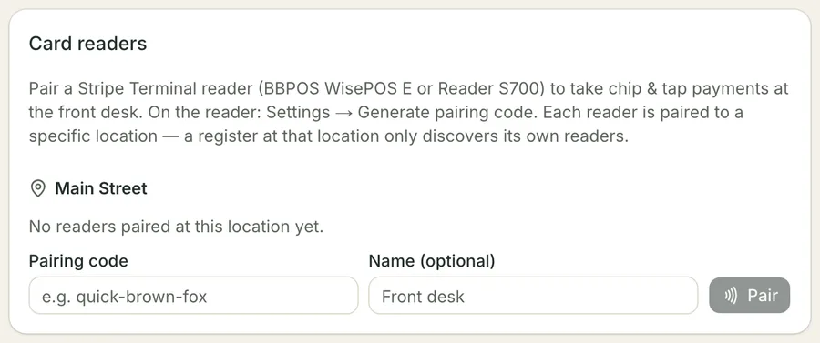 The Card readers section: an explanation of which readers are supported and how to get a pairing code, then the salon's Main Street location with no readers paired yet and a pairing code and name field beside a Pair button.