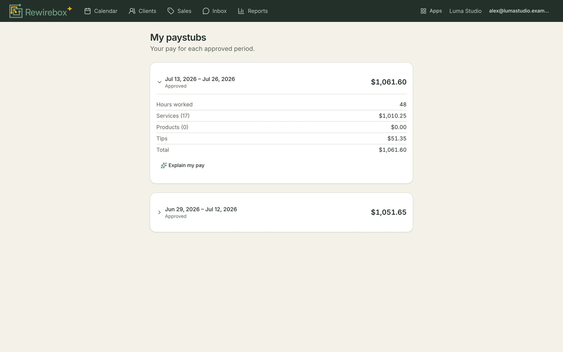 My paystubs with one approved period expanded: hours worked, services, products, tips and the total, above an Explain my pay button.
