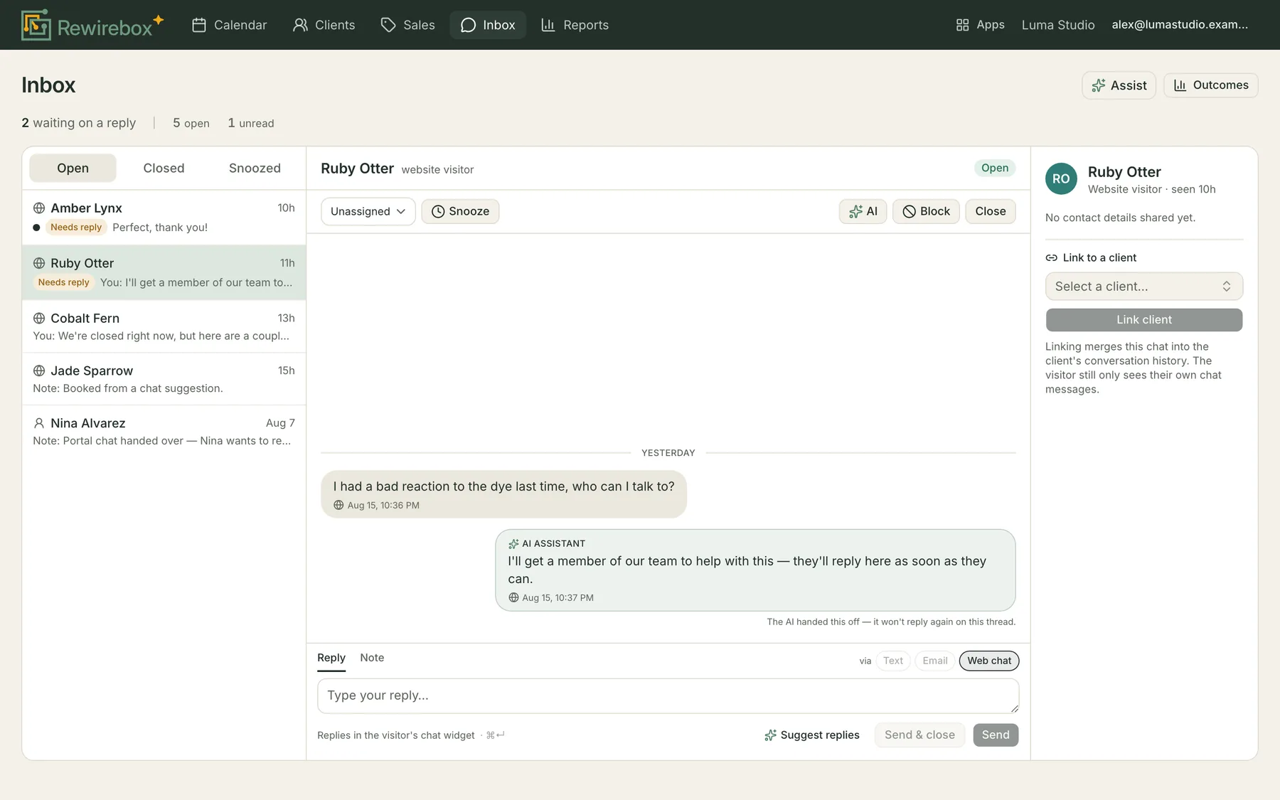 The Inbox showing a web-chat thread where a visitor reports a bad reaction to dye: the AI assistant replies only that it will fetch a member of the team, and a line beneath reads that the AI handed this off and won't reply again on this thread.